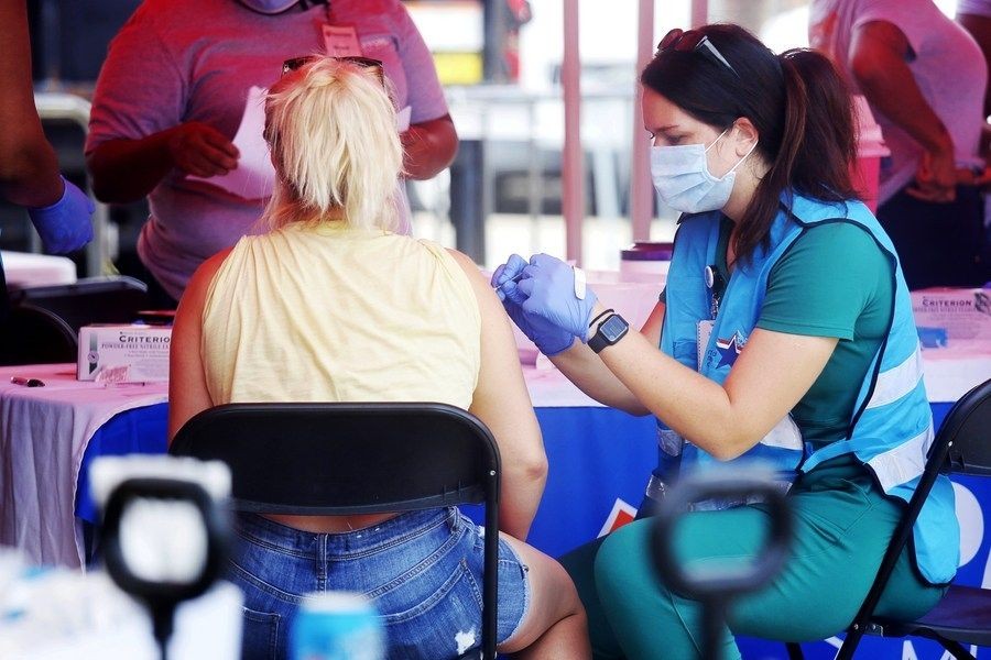 A woman receives a dose of monkeypox vaccine in New Orleans, the United States, Aug. 13, 2022. (Photo by Lan Wei/Xinhua/IANS)